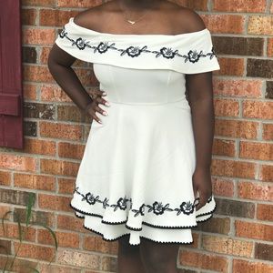 Floral embroidered off the shoulder dress.